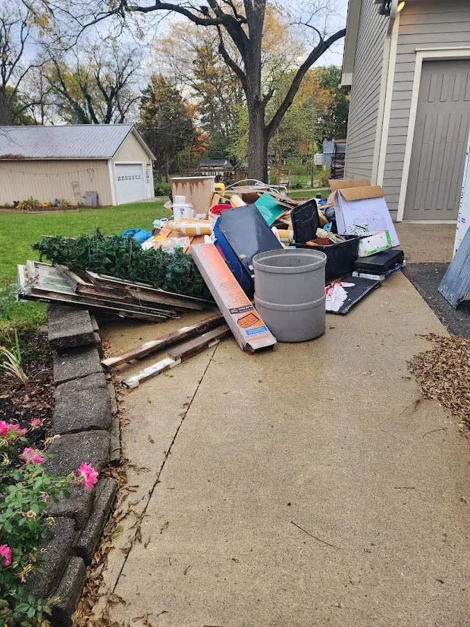 Dumpster being loaded with debris for 30 Yard Dumpster Rental in Rancho Murieta